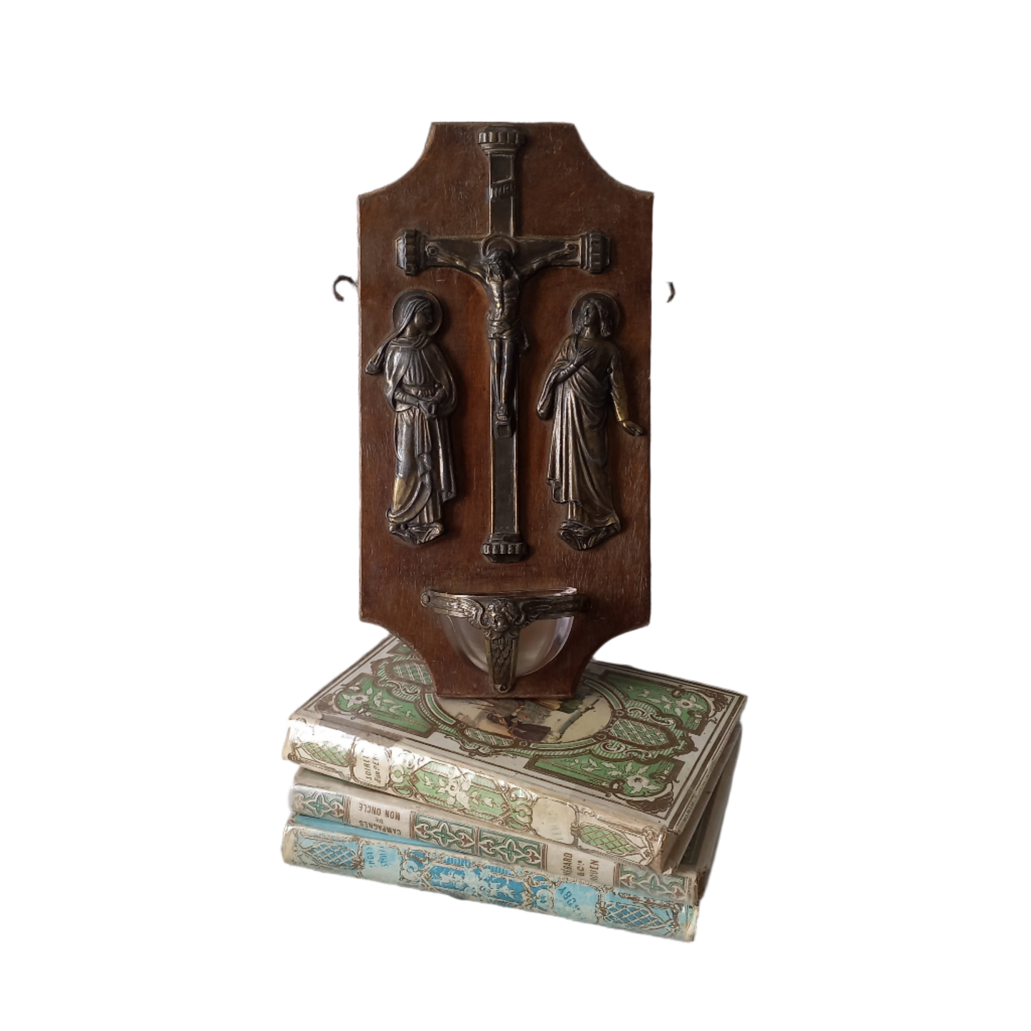 Wall-mounted vintage/antique religious wall decor with metal crucifix and religious figures, and a glass Holy Water font mounted to a wooden base. A great piece of original religious decor from France.