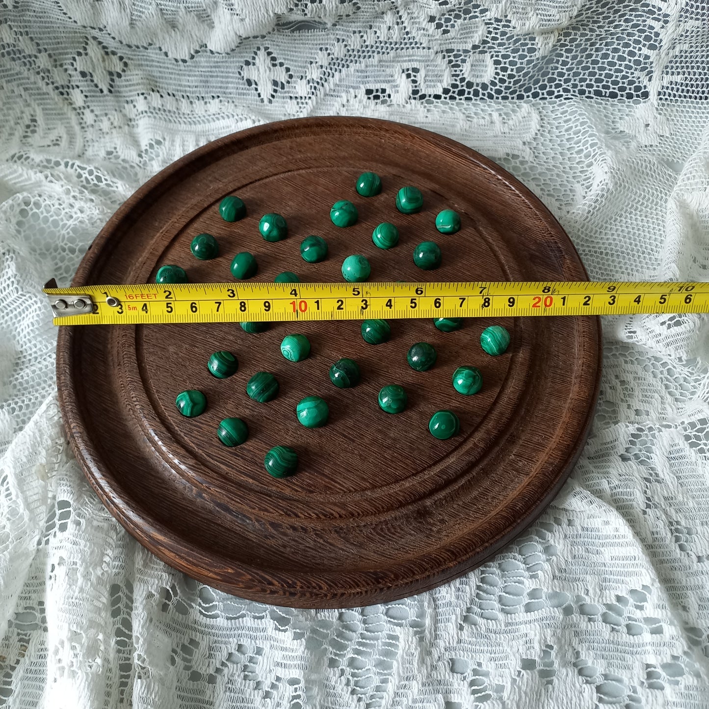 Handmade wooden solitaire board with semi-precious malachite marbles, decorative vintage board game