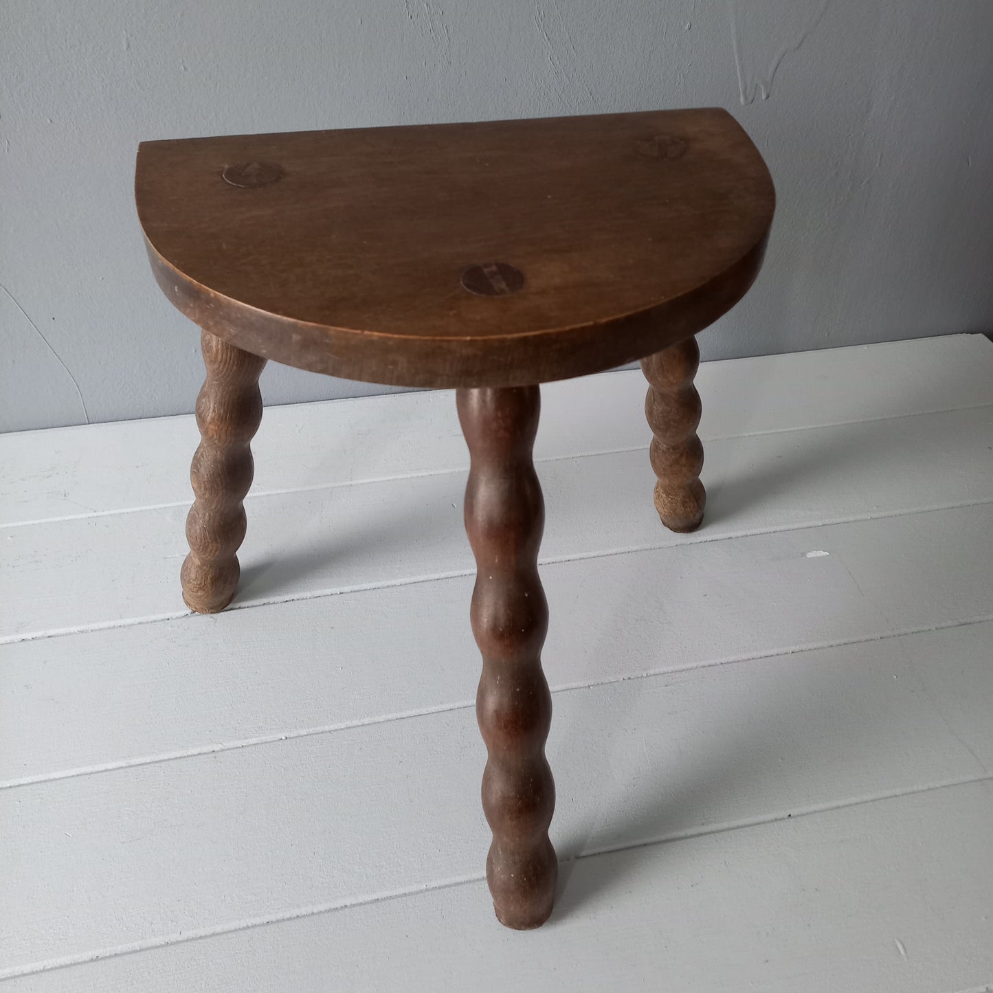 Vintage wooden stool with three turned wooden legs, rustic farmhouse decor, plant stand