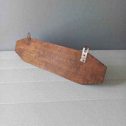 Vintage wooden coat rack with two metal coat hooks