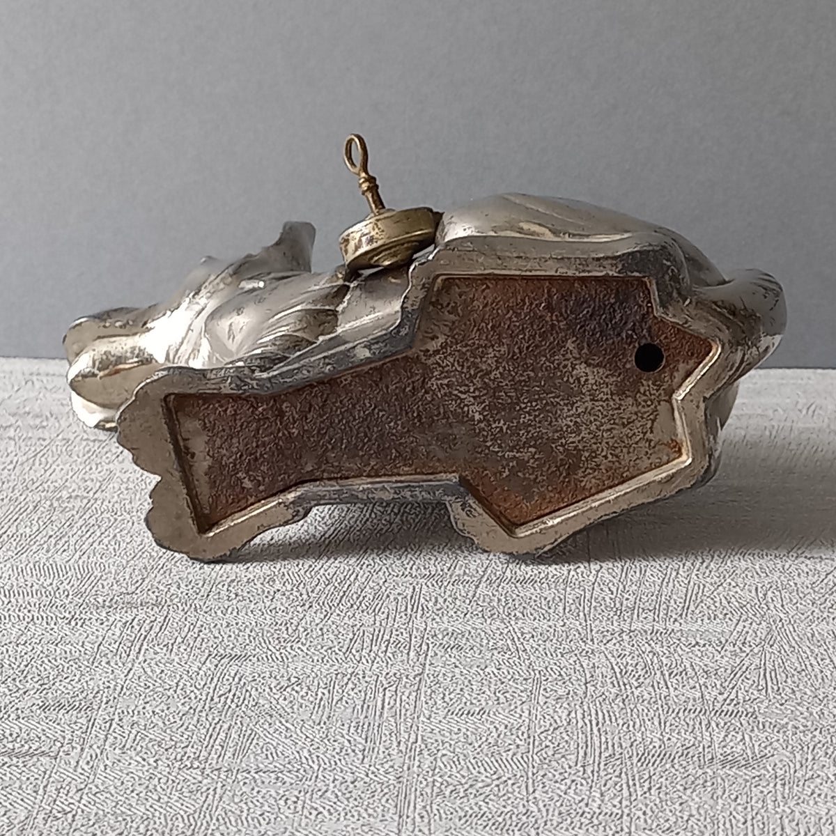 A fabulous French art deco metal terrier dog money box/coin storage box complete with a little padlock and key which still work. 

This unique piece of history was purchased in south west France and we can only imagine who once owned it and what they might have saved their coins to buy.