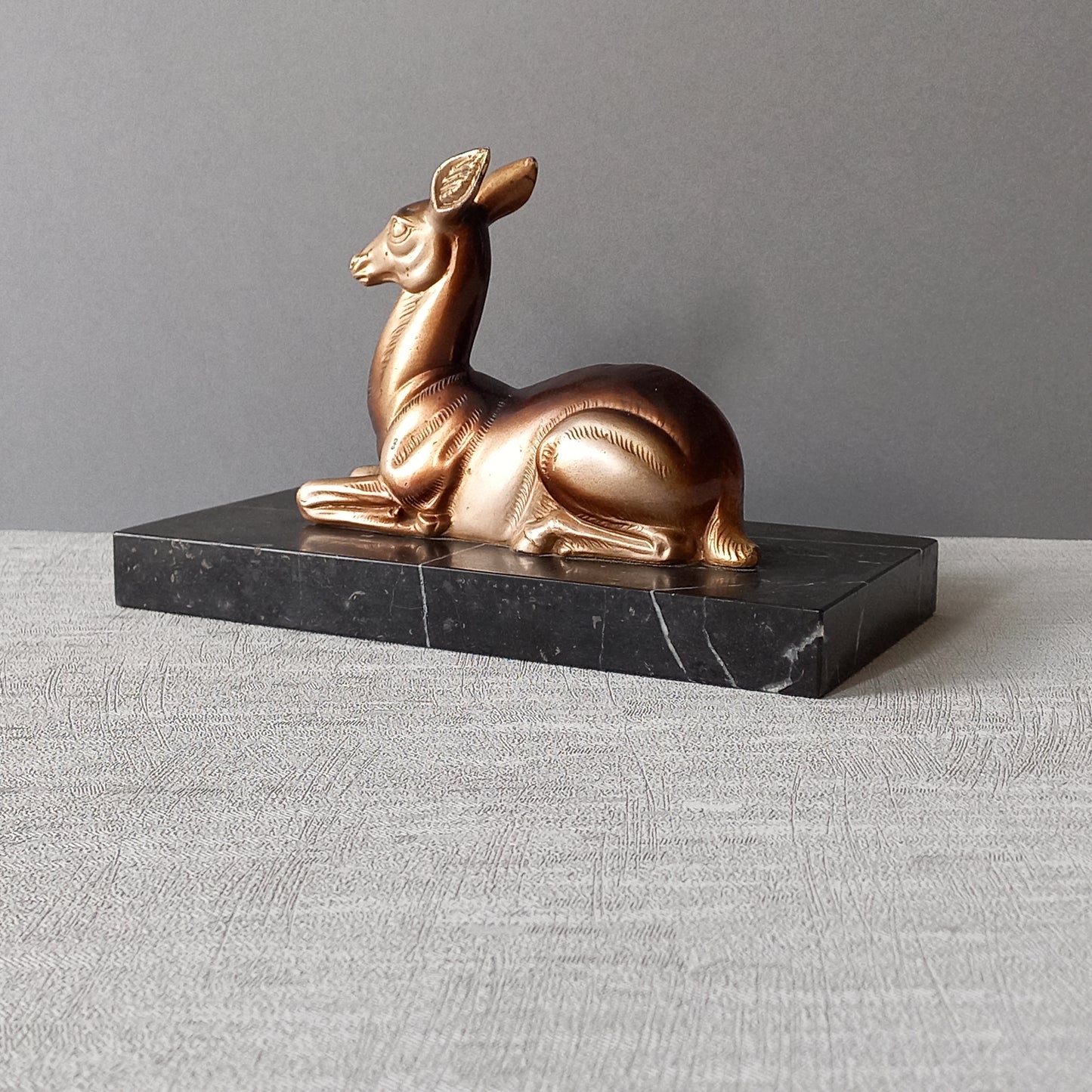 Vintage deer ornament on a marble base, art deco desk decor