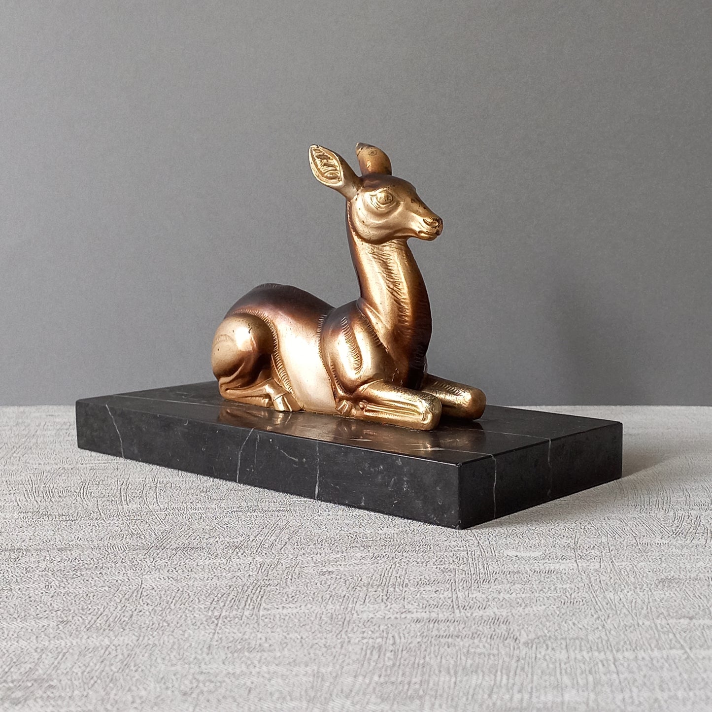 Vintage deer ornament on a marble base, art deco desk decor