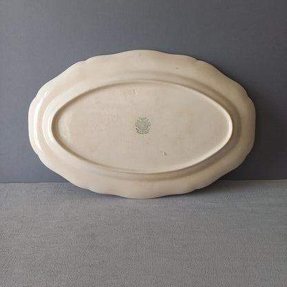 Vintage oval serving plate or platter in tea-stained creamy white colour by Villeroy & Boch