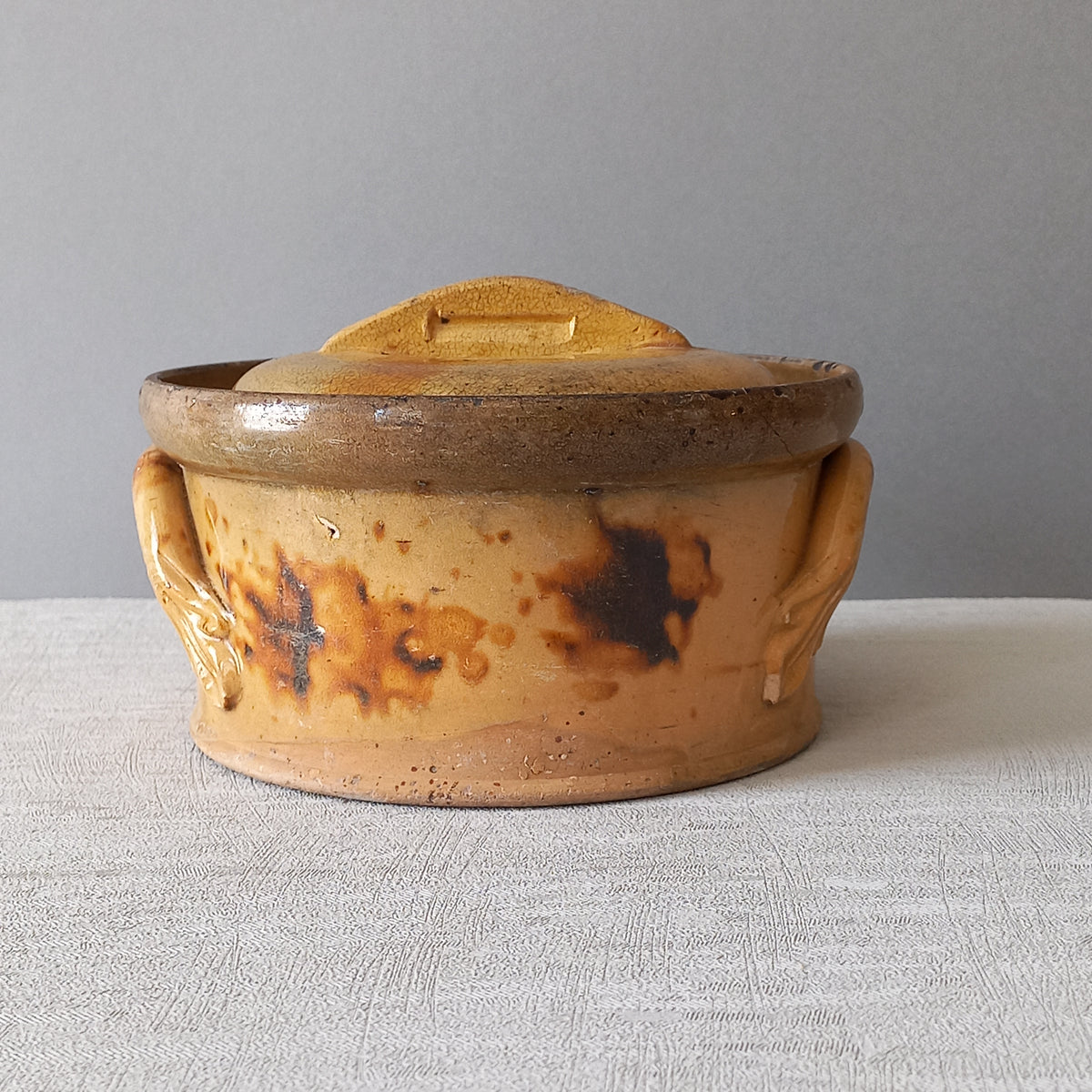 Antique casserole dish from France, ochre stoneware terrine
