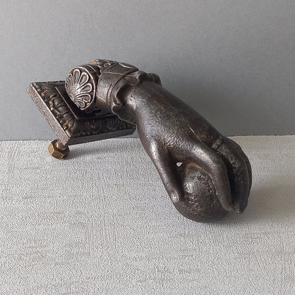 French antique door knocker made from cast iron, female hand door knocker