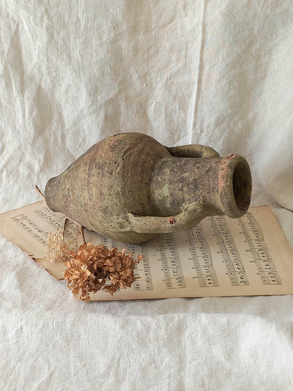 antique hand-made terracotta stoneware storage pot. With its ancient Greek inspired lines and rough texture it would make a absolutely beautiful piece of home decor in a rustic, farmhouse or country-inspired interior.