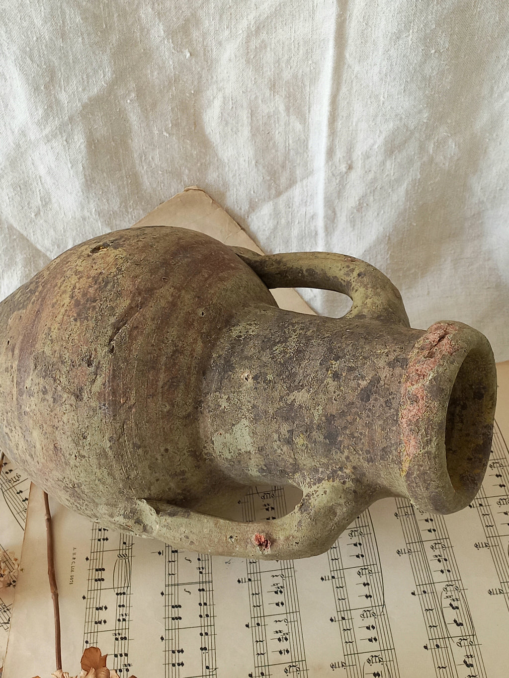 antique hand-made terracotta stoneware storage pot. With its ancient Greek inspired lines and rough texture it would make a absolutely beautiful piece of home decor in a rustic, farmhouse or country-inspired interior.