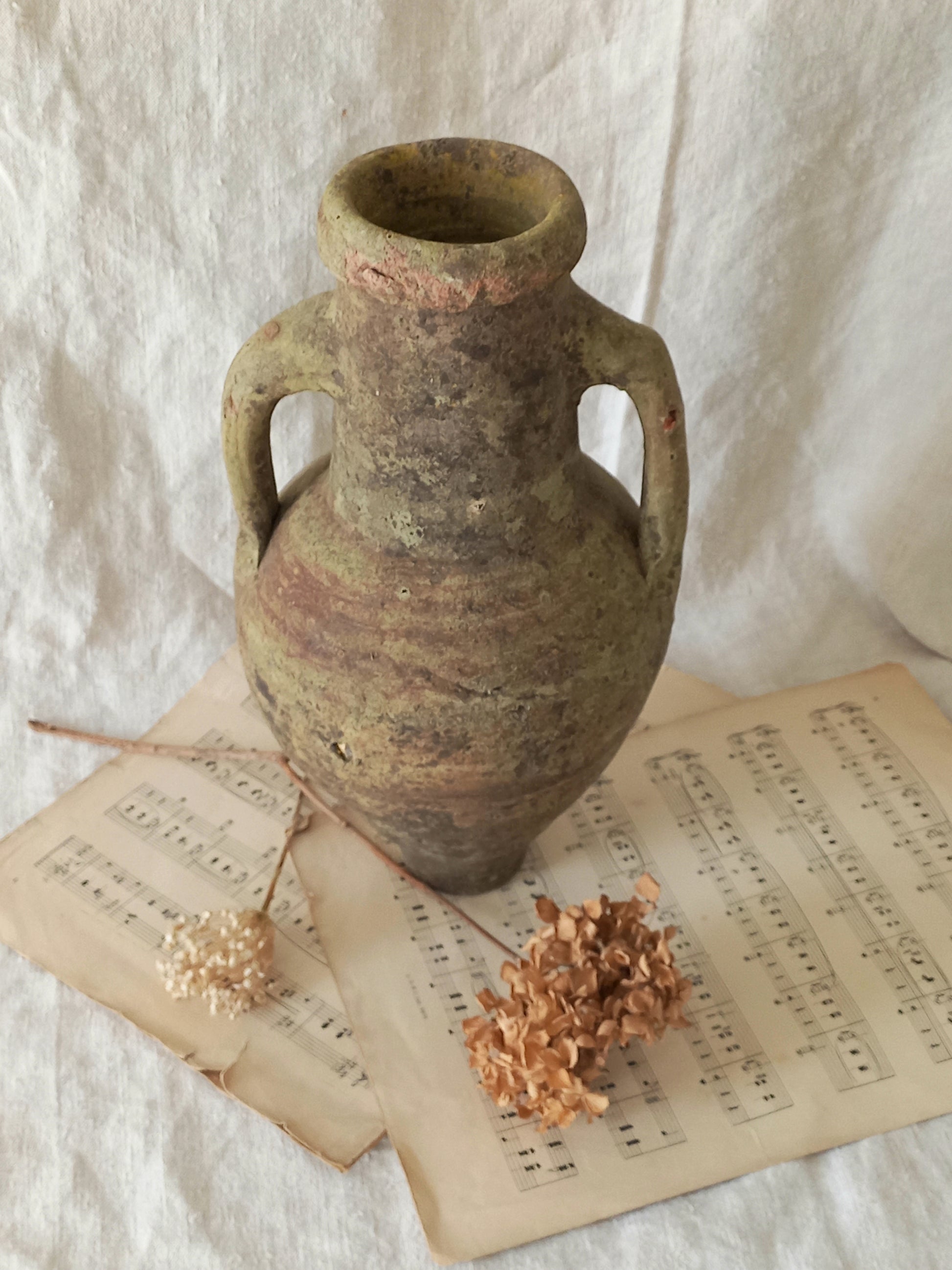 antique hand-made terracotta stoneware storage pot. With its ancient Greek inspired lines and rough texture it would make a absolutely beautiful piece of home decor in a rustic, farmhouse or country-inspired interior.