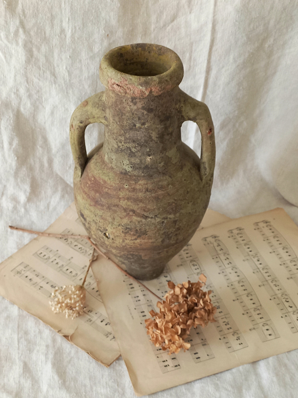 antique hand-made terracotta stoneware storage pot. With its ancient Greek inspired lines and rough texture it would make a absolutely beautiful piece of home decor in a rustic, farmhouse or country-inspired interior.