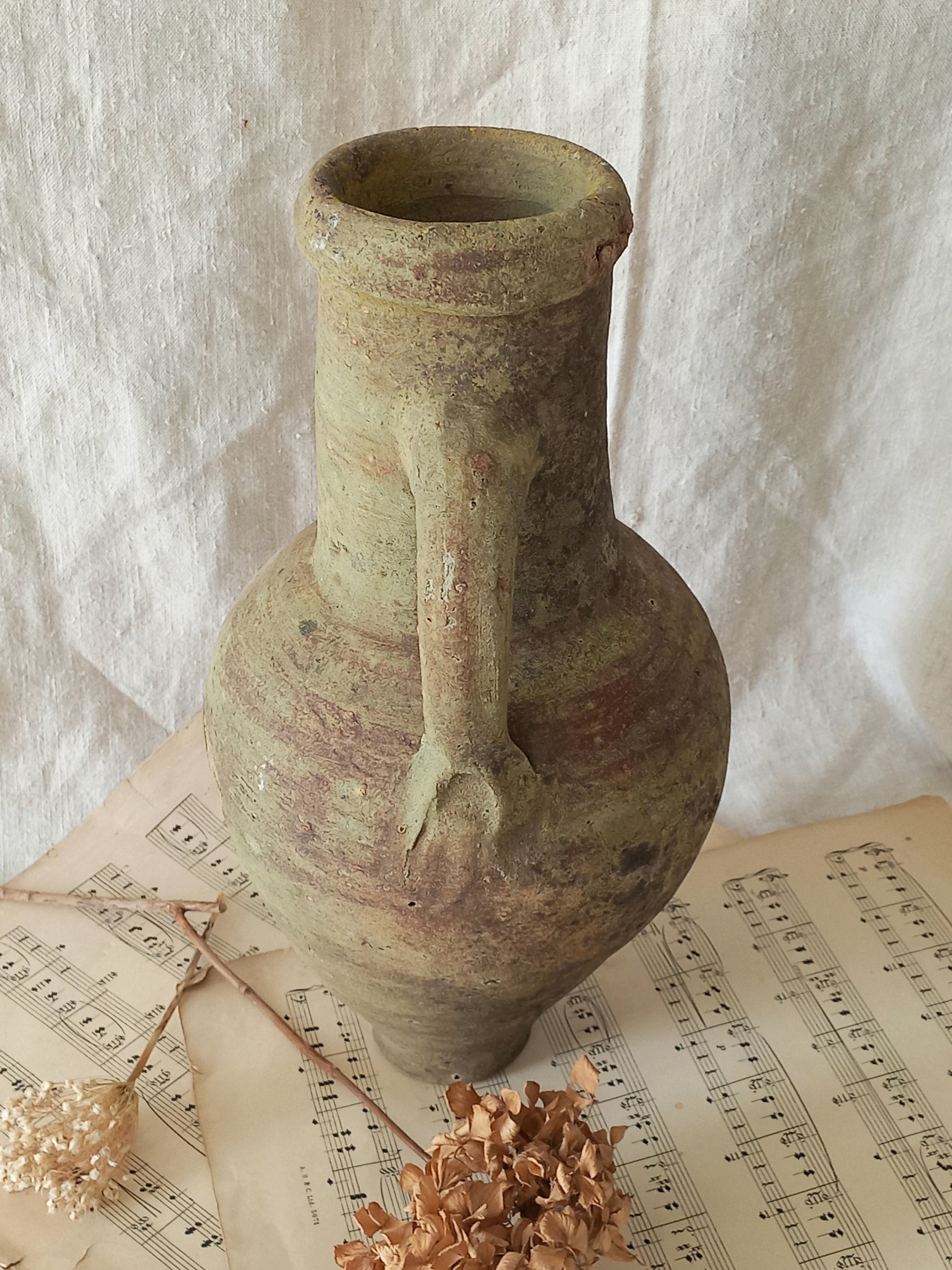 antique hand-made terracotta stoneware storage pot. With its ancient Greek inspired lines and rough texture it would make a absolutely beautiful piece of home decor in a rustic, farmhouse or country-inspired interior.