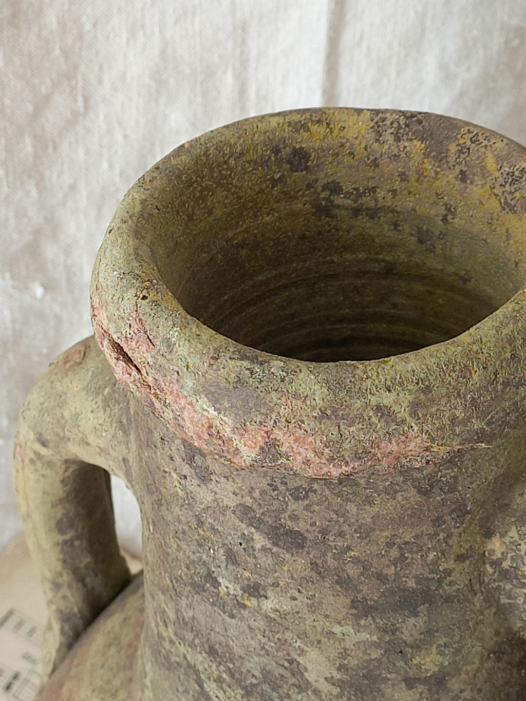 antique hand-made terracotta stoneware storage pot. With its ancient Greek inspired lines and rough texture it would make a absolutely beautiful piece of home decor in a rustic, farmhouse or country-inspired interior.