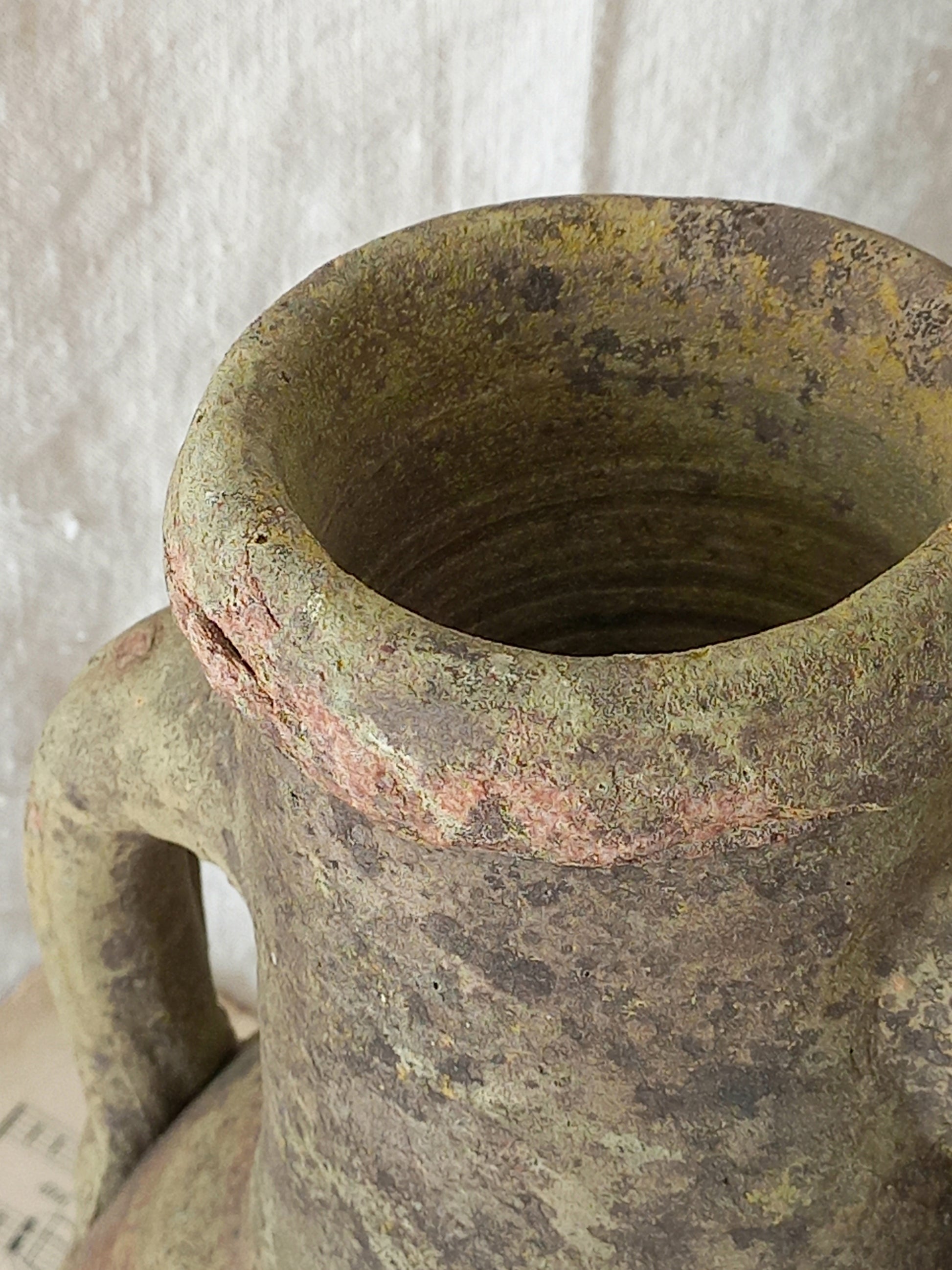 antique hand-made terracotta stoneware storage pot. With its ancient Greek inspired lines and rough texture it would make a absolutely beautiful piece of home decor in a rustic, farmhouse or country-inspired interior.
