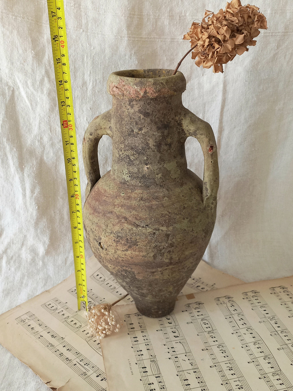 antique hand-made terracotta stoneware storage pot. With its ancient Greek inspired lines and rough texture it would make a absolutely beautiful piece of home decor in a rustic, farmhouse or country-inspired interior.
