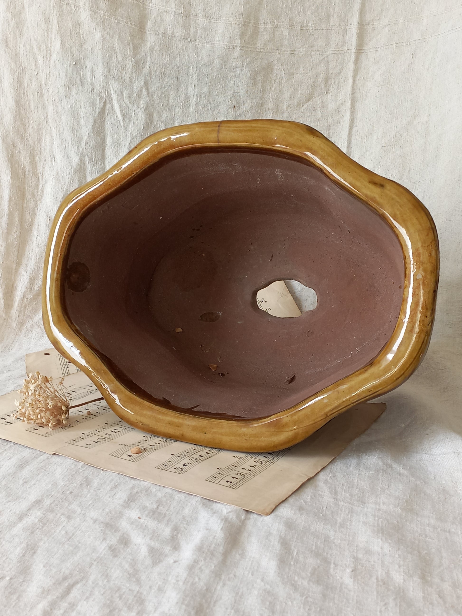 A stunning decorative glazed stoneware planter with oriental animal and floral design influences. 