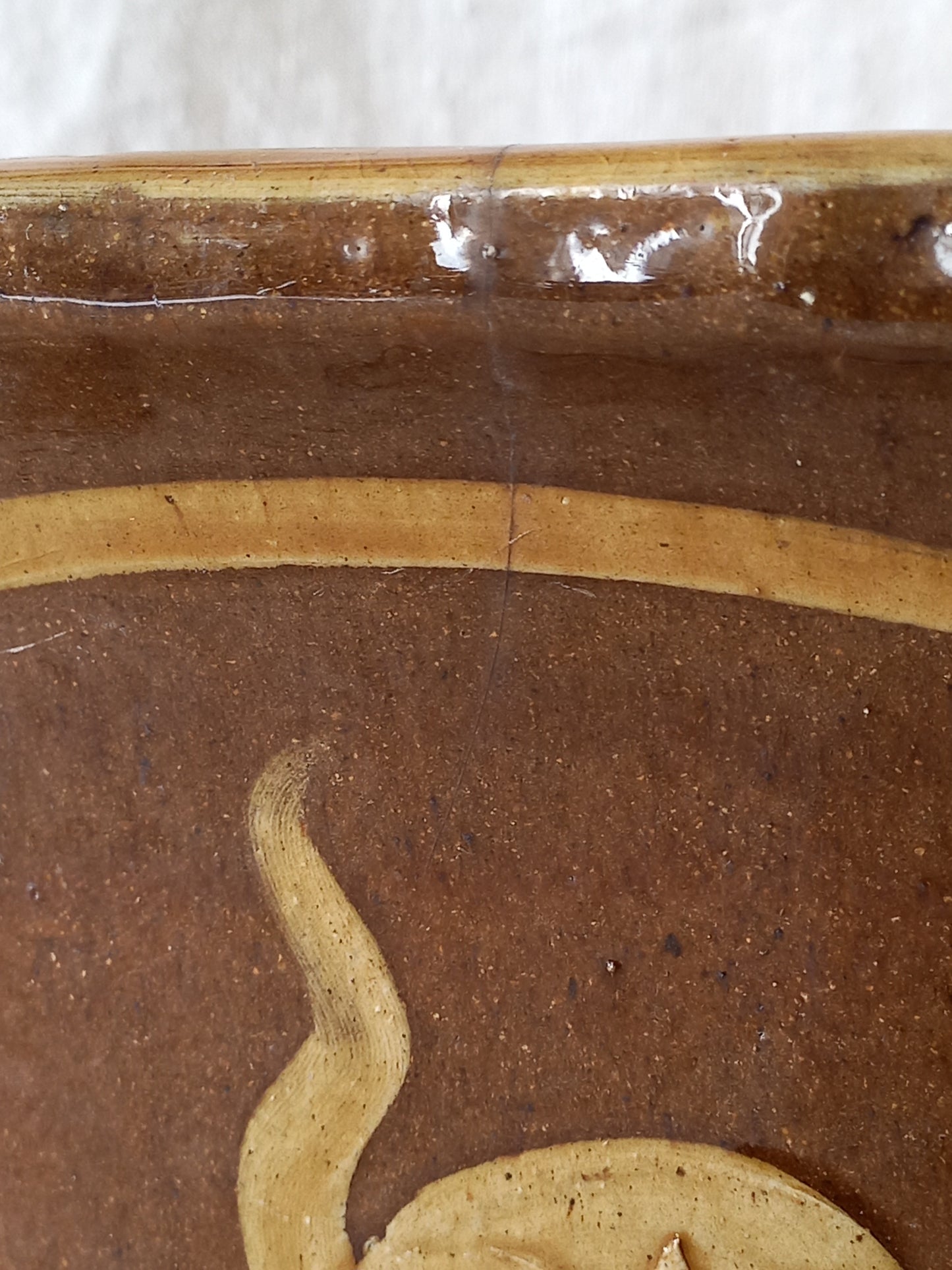 A stunning decorative glazed stoneware planter with oriental animal and floral design influences. 