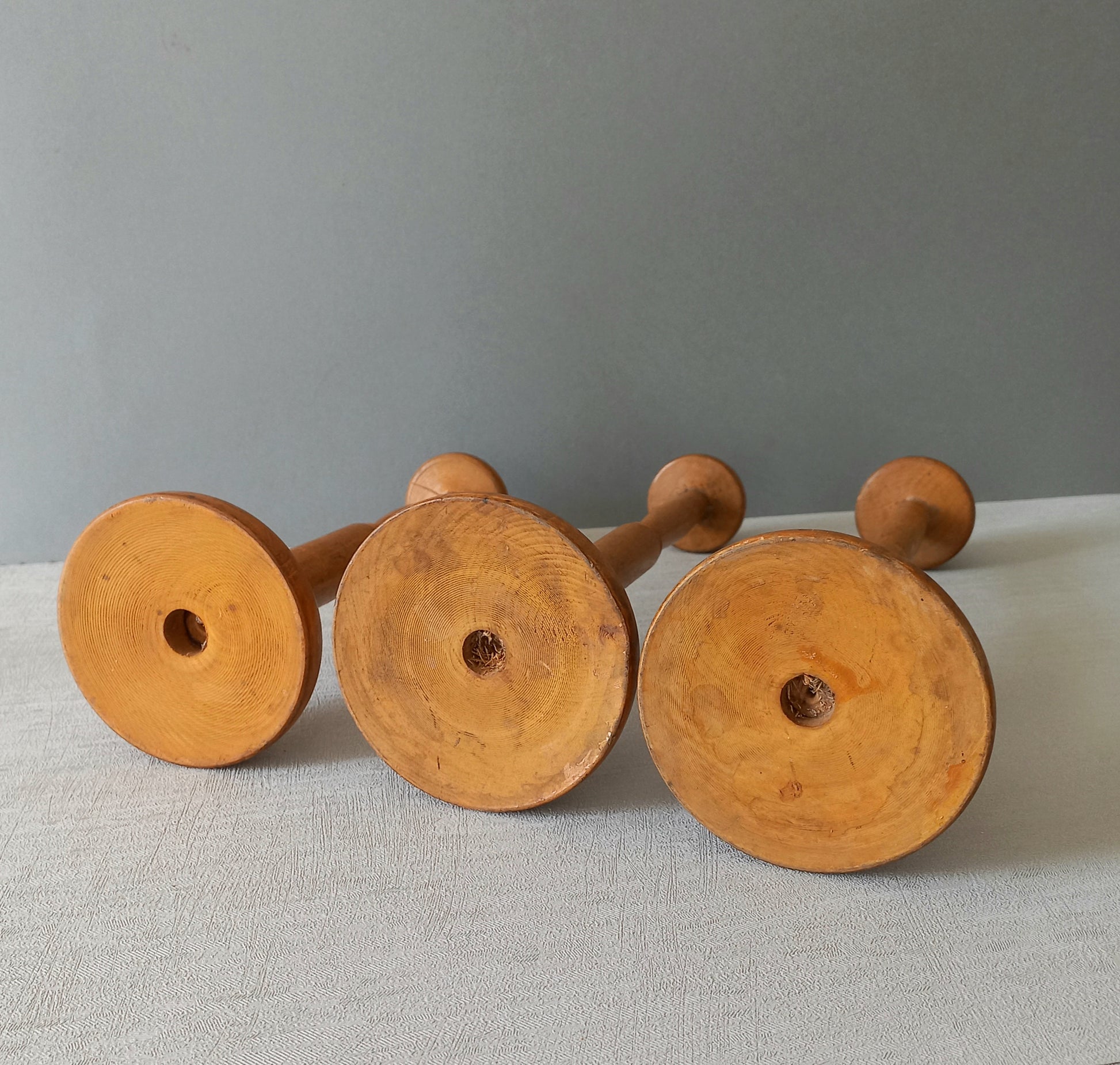 Three vintage wooden hat stands