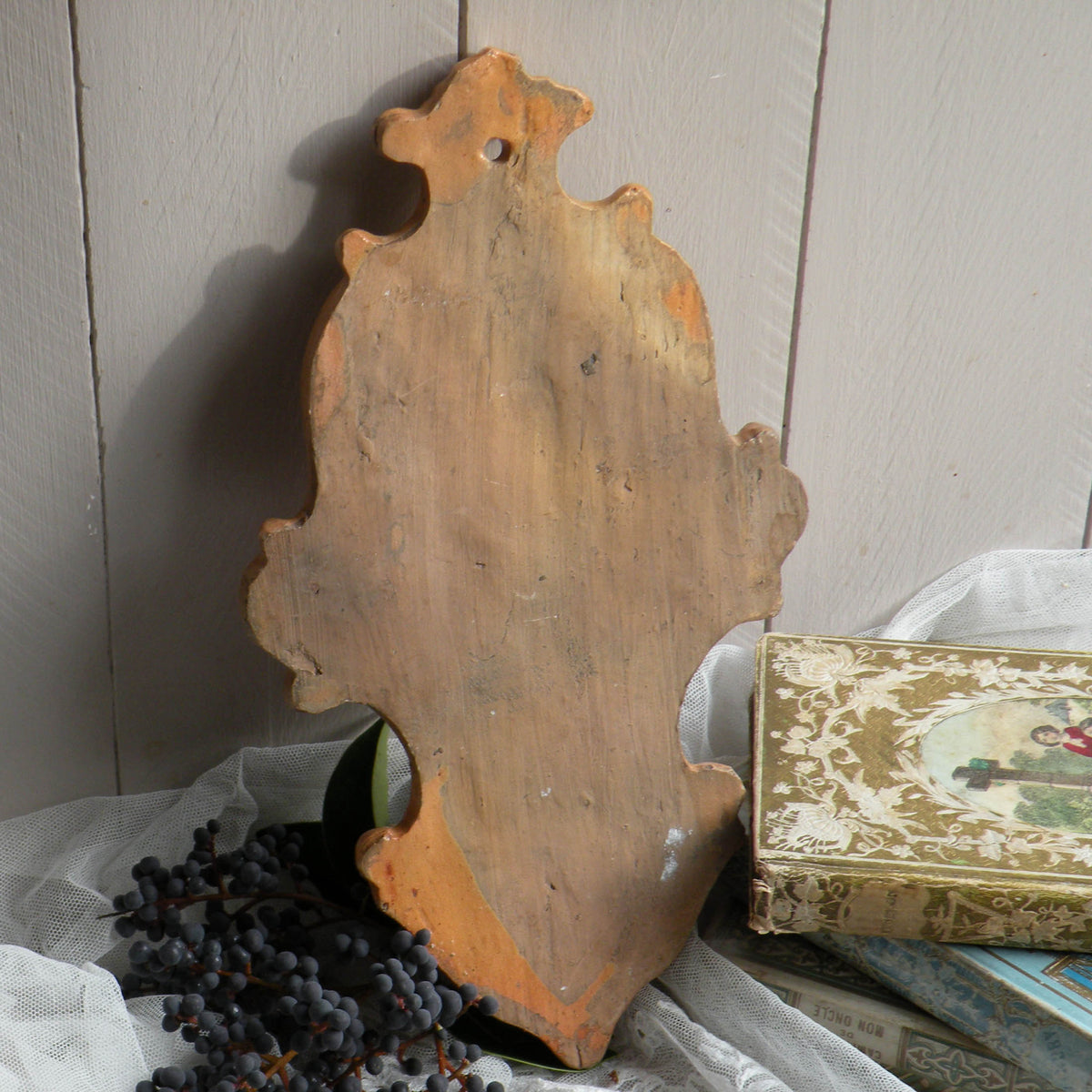 Rear of French antique glazed stoneware Holy Water font/stoup with Jesus Christ in relief.