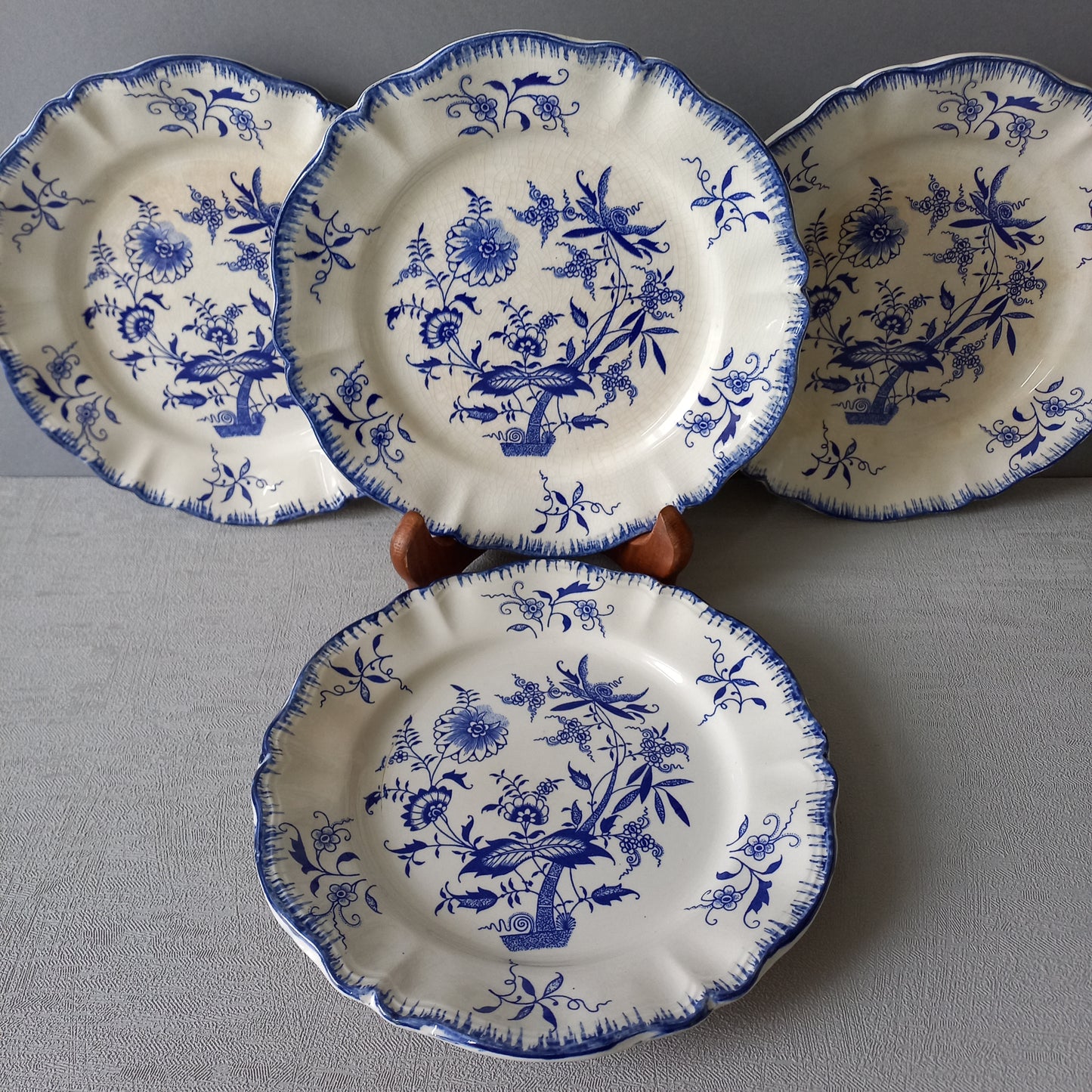 Antique ironstone white plates with blue floral patterns from France