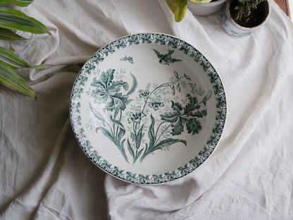 A French antique ironstone jug, basin and soap dish, printed in a soft teal-green bird-and-floral pattern. 