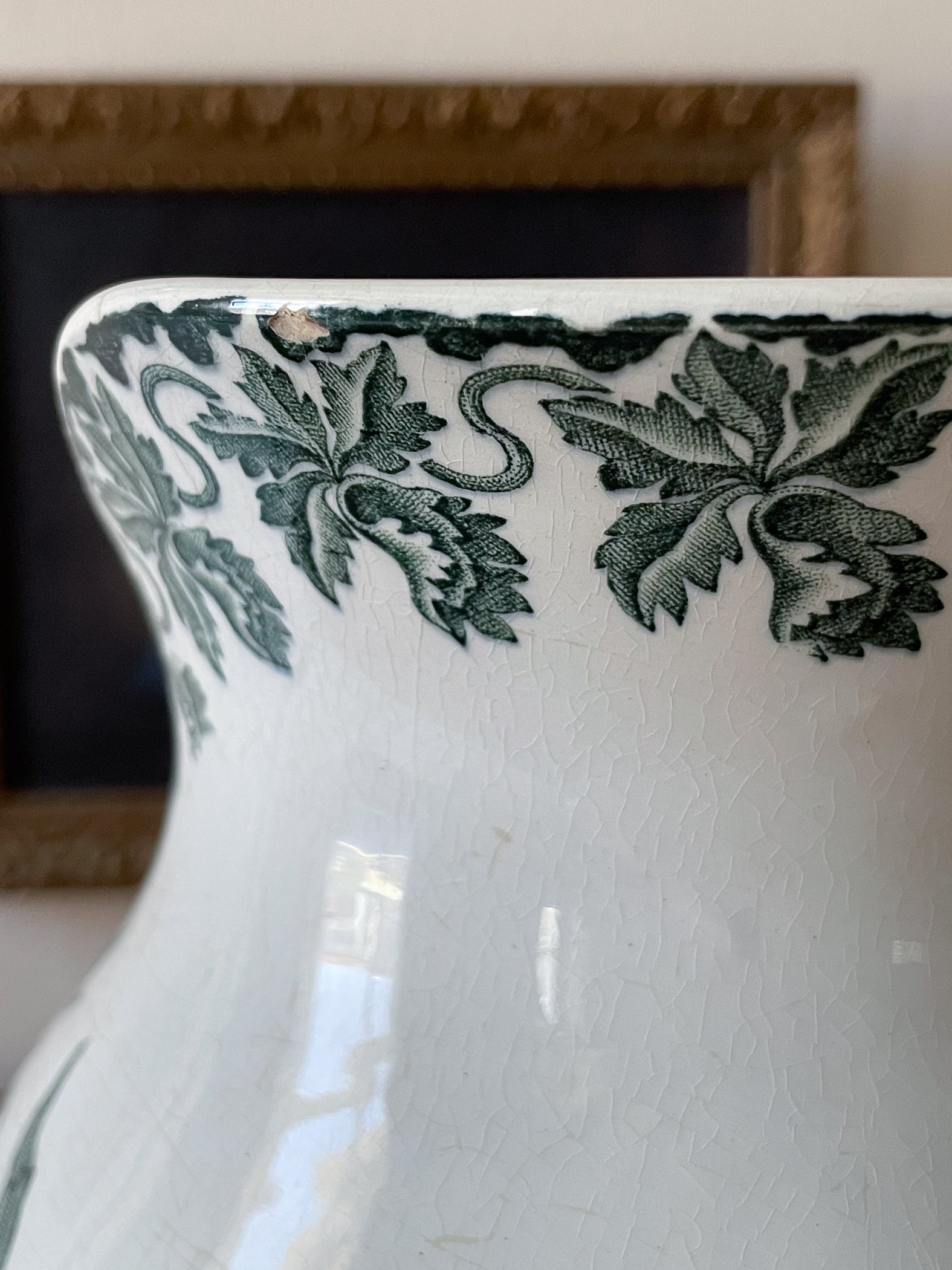 A French antique ironstone jug, basin and soap dish, printed in a soft teal-green bird-and-floral pattern. 