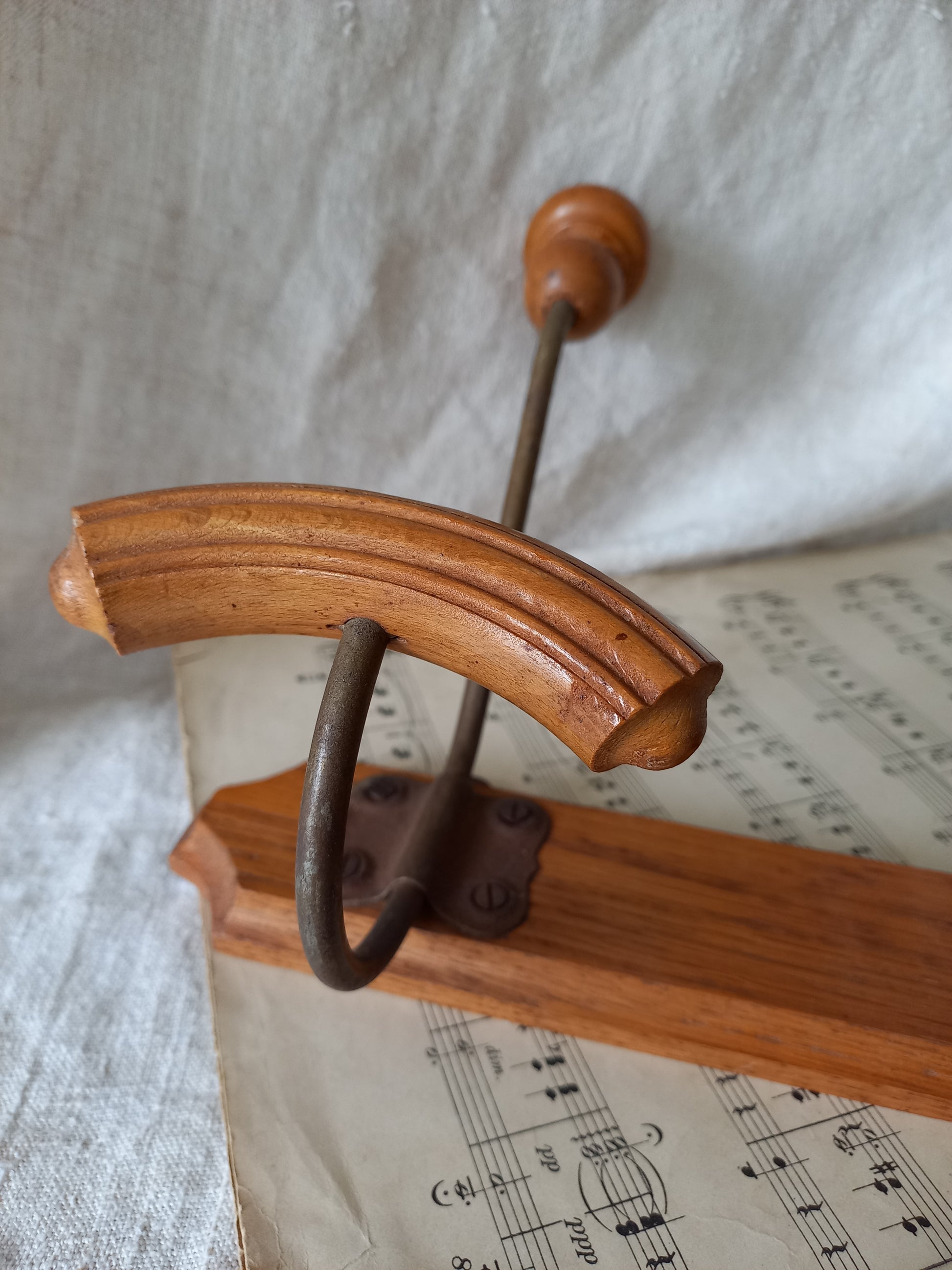 close-up of a French vintage coat and hat rack.
