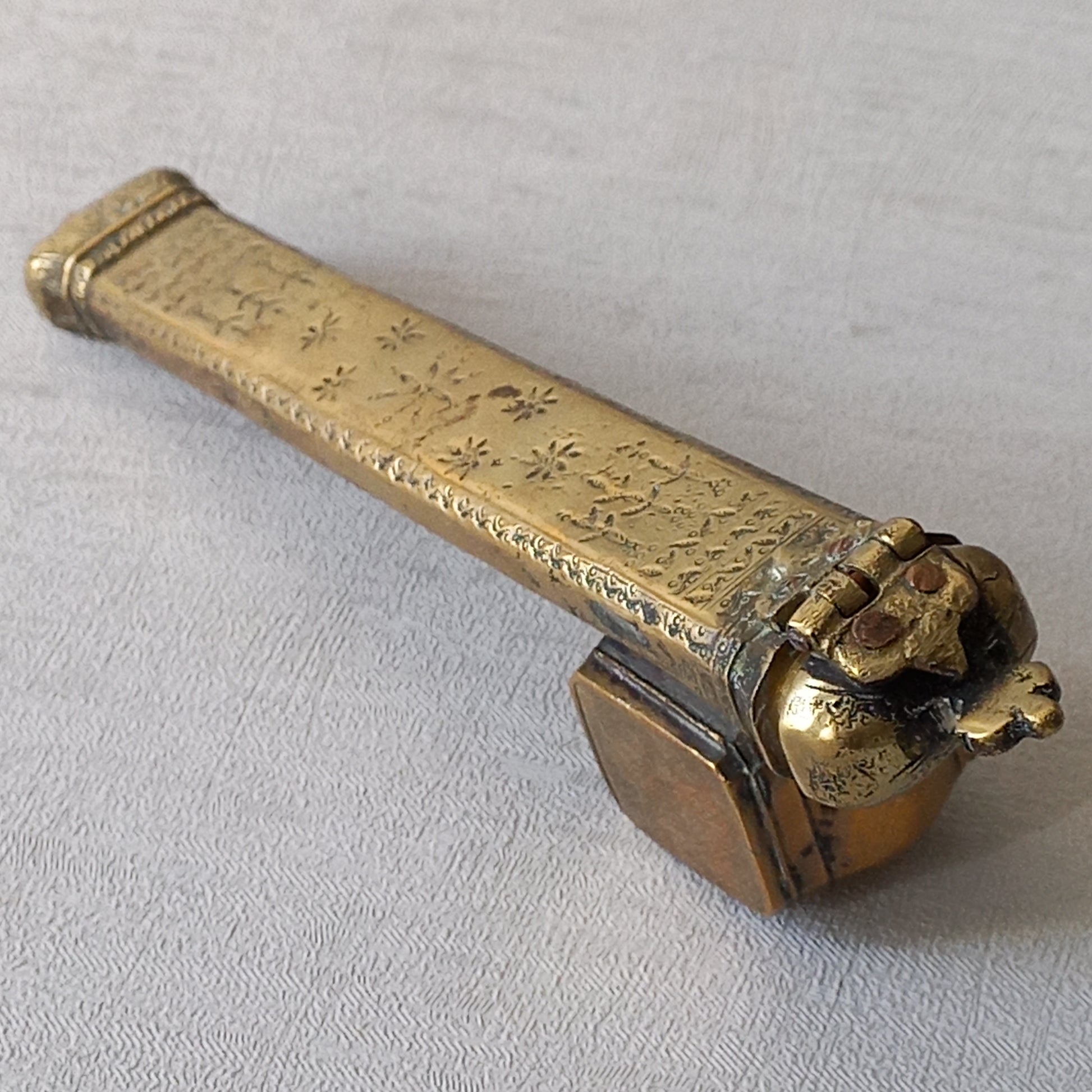 An antique decorative brass inkwell and quill storage case, a really wonderful piece of desk or shelve decor that is a real eye catcher.