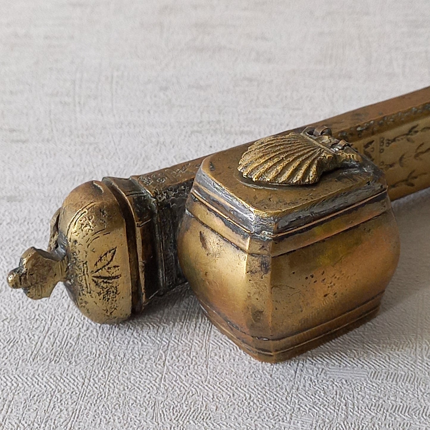 An antique decorative brass inkwell and quill storage case, a really wonderful piece of desk or shelve decor that is a real eye catcher.