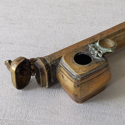 An antique decorative brass inkwell and quill storage case, a really wonderful piece of desk or shelve decor that is a real eye catcher.