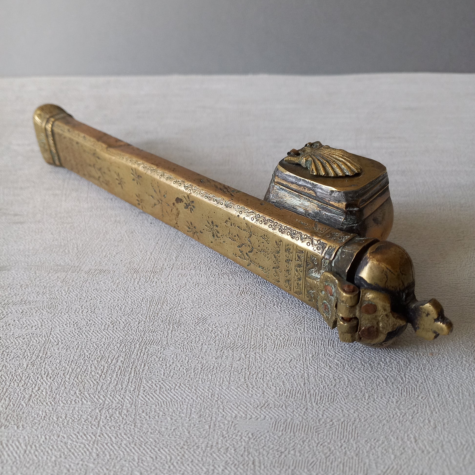 An antique decorative brass inkwell and quill storage case, a really wonderful piece of desk or shelve decor that is a real eye catcher.