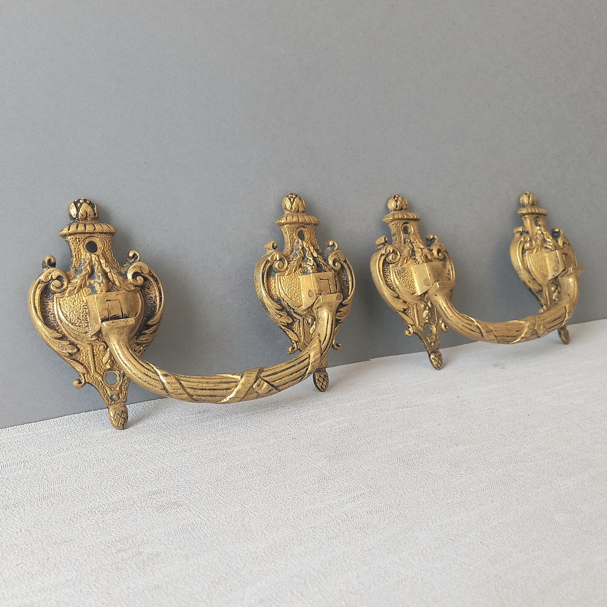 A pair of stunning French antique bronze drawer handles, elegant and decorative pieces to add the finishing touches to your drawers.