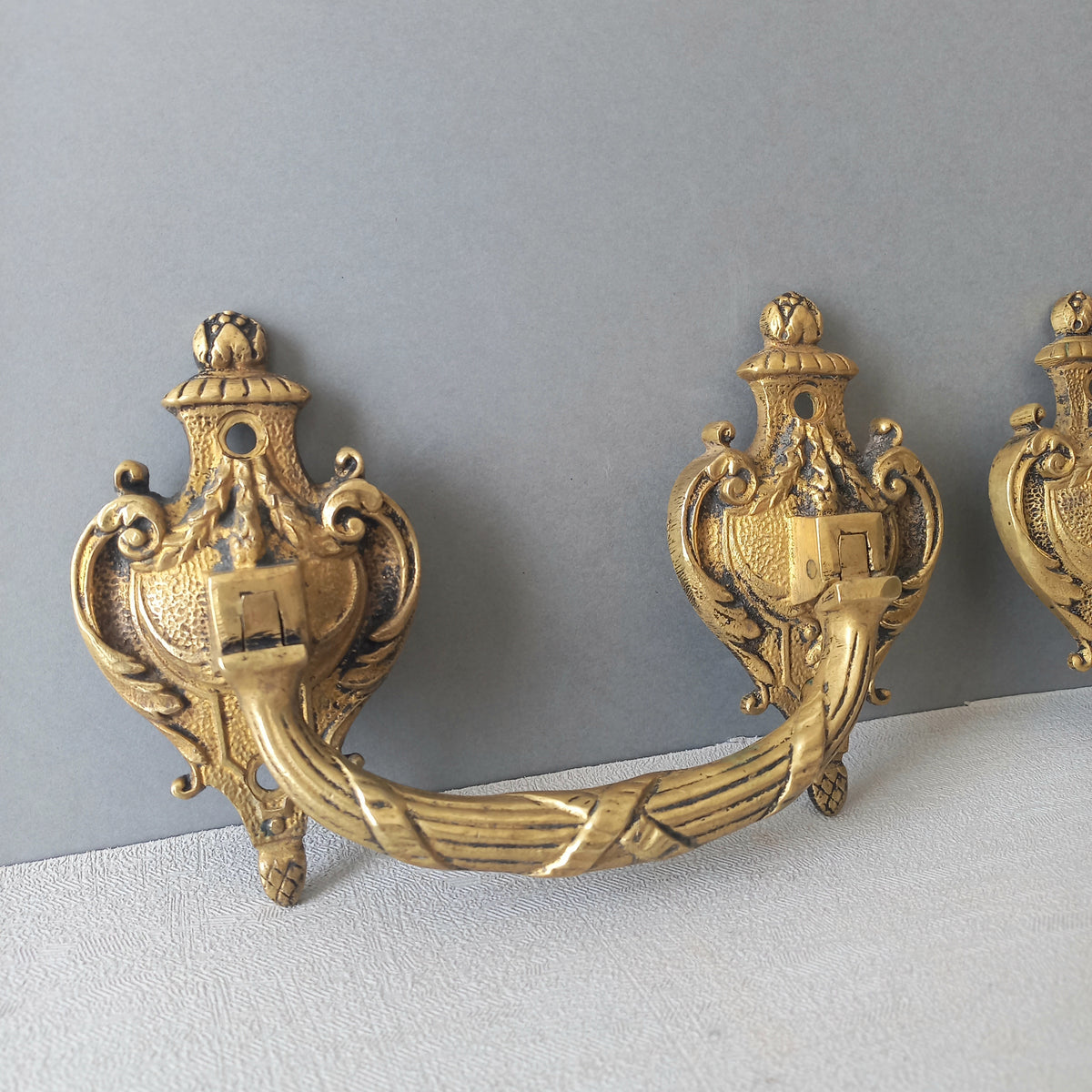 A pair of stunning French antique bronze drawer handles, elegant and decorative pieces to add the finishing touches to your drawers.