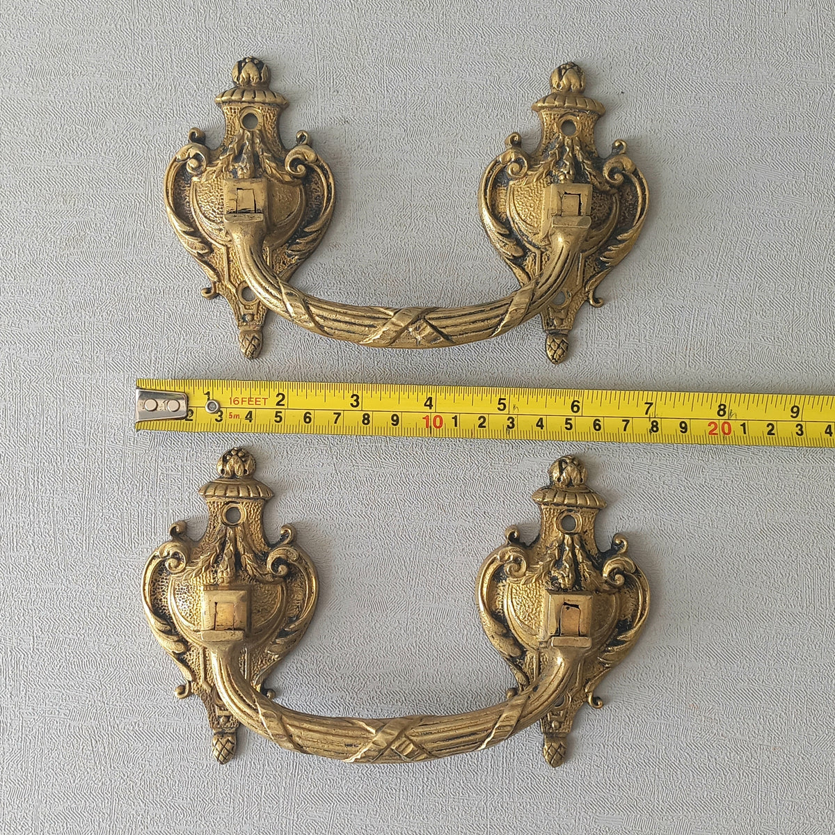 A pair of stunning French antique bronze drawer handles, elegant and decorative pieces to add the finishing touches to your drawers.