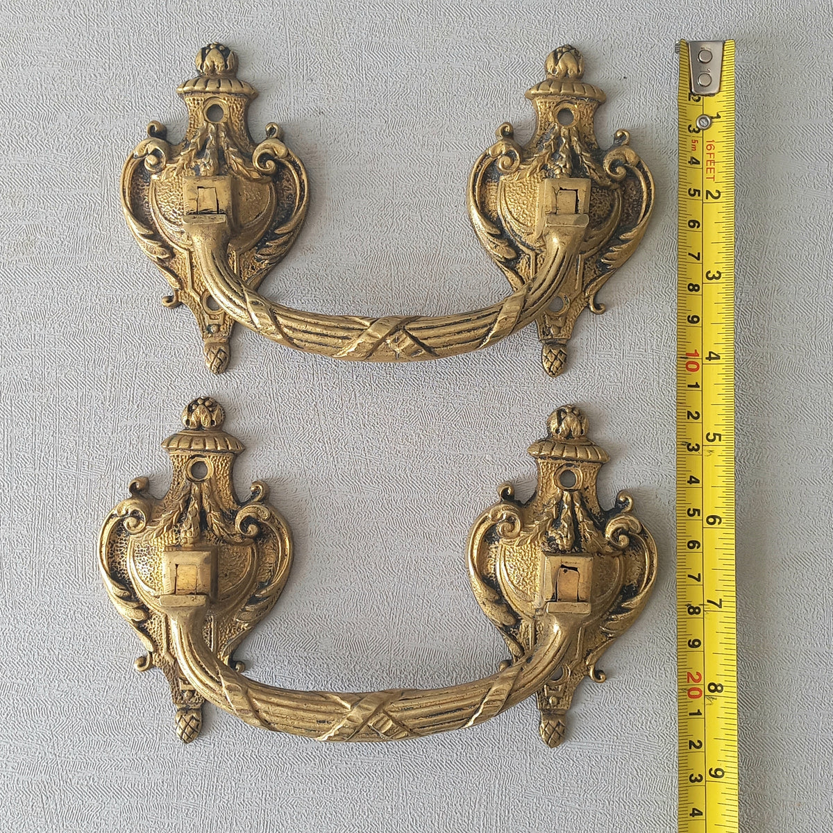 A pair of stunning French antique bronze drawer handles, elegant and decorative pieces to add the finishing touches to your drawers.