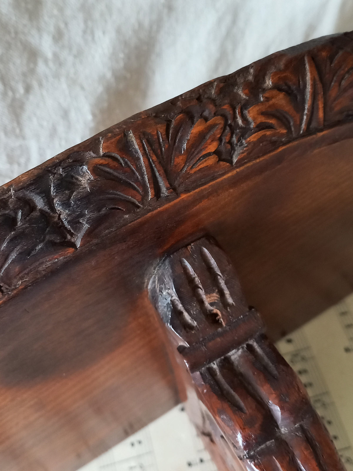 Close-up of a French vintage/antique decorative carved wooden wall mounted shelf.