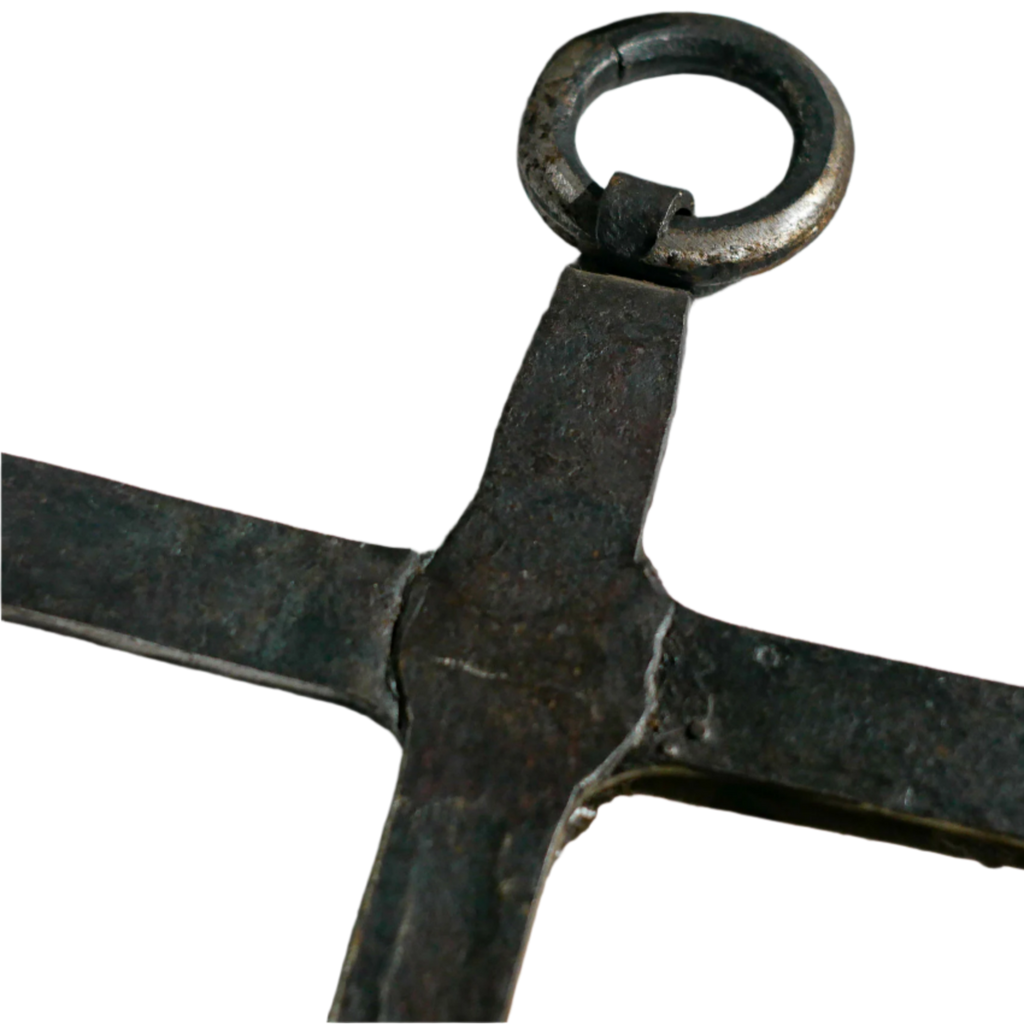 An interesting French antique artisan made Crucifix made from iron and painted black. On one side the metal has worn away in places giving this piece a pleasing patina of age. There's a hanging loop so it's ready to hang in your home.

We guesstimate this piece to be over 100 years old.