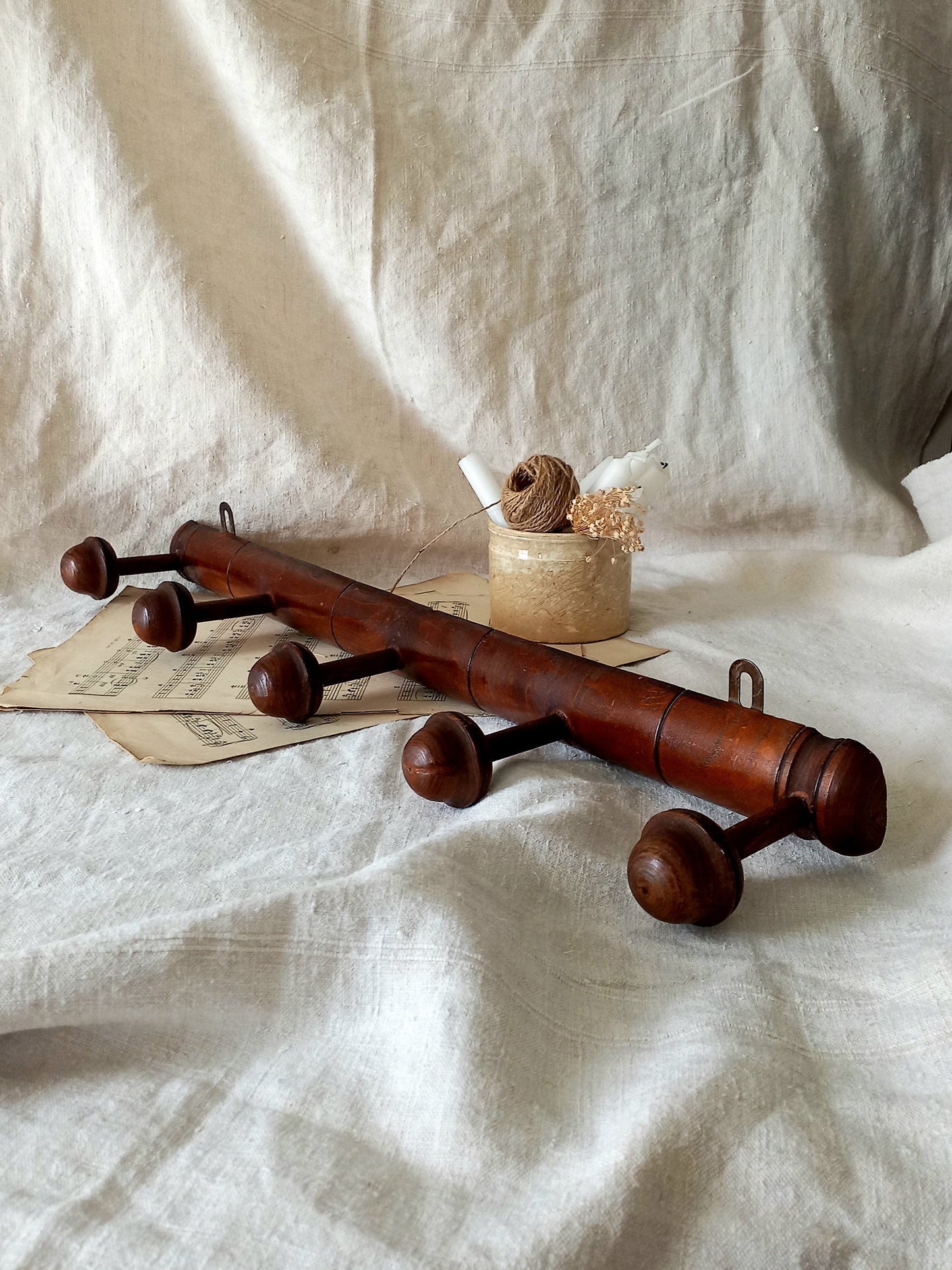 A French vintage faux bamboo wooden coat rack with 5 hanging hooks/pegs.