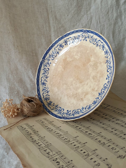 A beautiful French antique footed dish/cake stand with a striking dark blue floral pattern made by premier manufacturer Sarreguemines.
