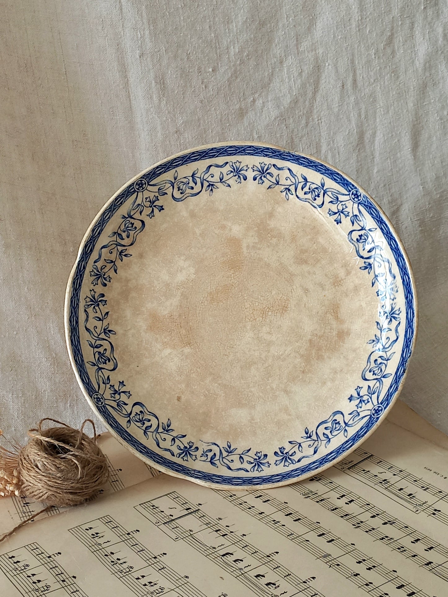 A beautiful French antique footed dish/cake stand with a striking dark blue floral pattern made by premier manufacturer Sarreguemines.
