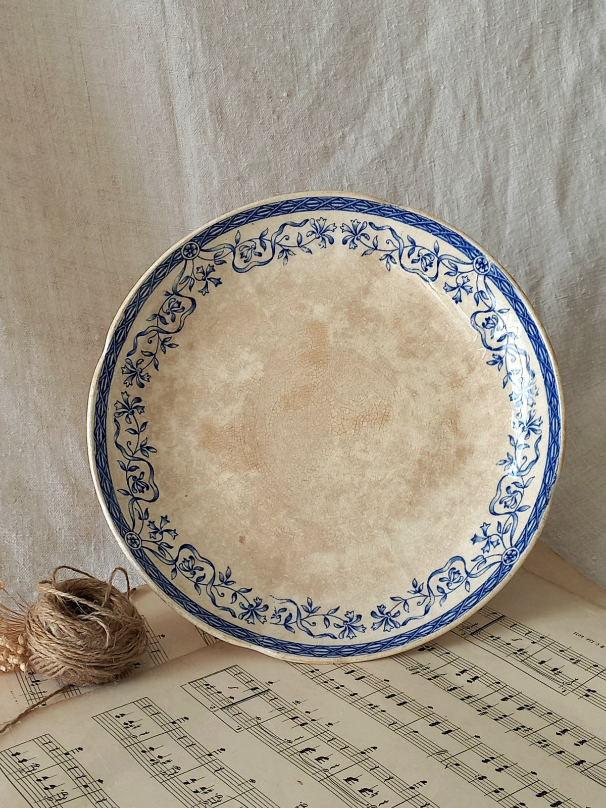 A beautiful French antique footed dish/cake stand with a striking dark blue floral pattern made by premier manufacturer Sarreguemines.
