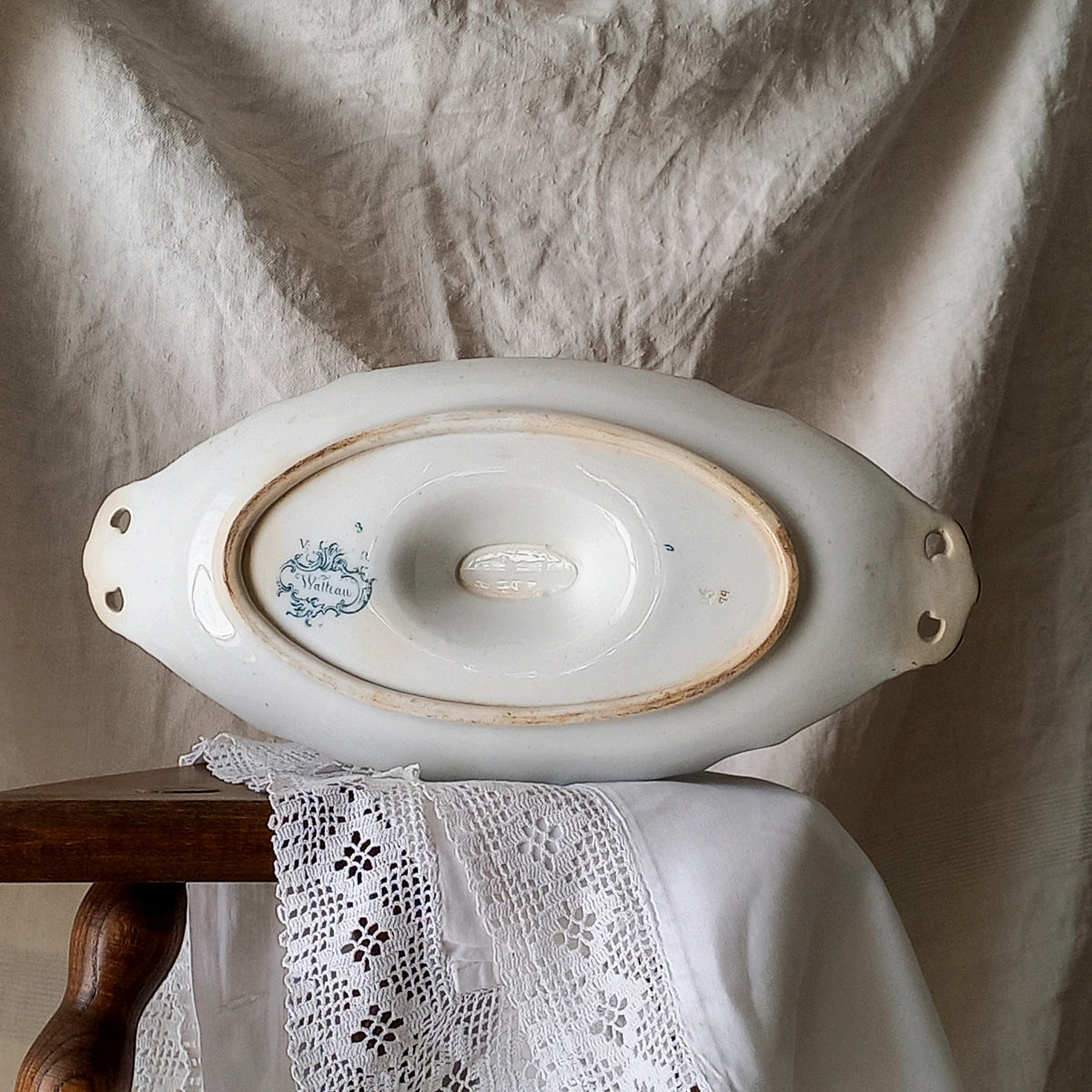 A large and elegant antique ironstone sauce boat with a green floral transferware pattern, a grand-looking, heavy piece. These days this piece will make an excellent piece of decor in any home, especially those of a country or farmhouse nature.
