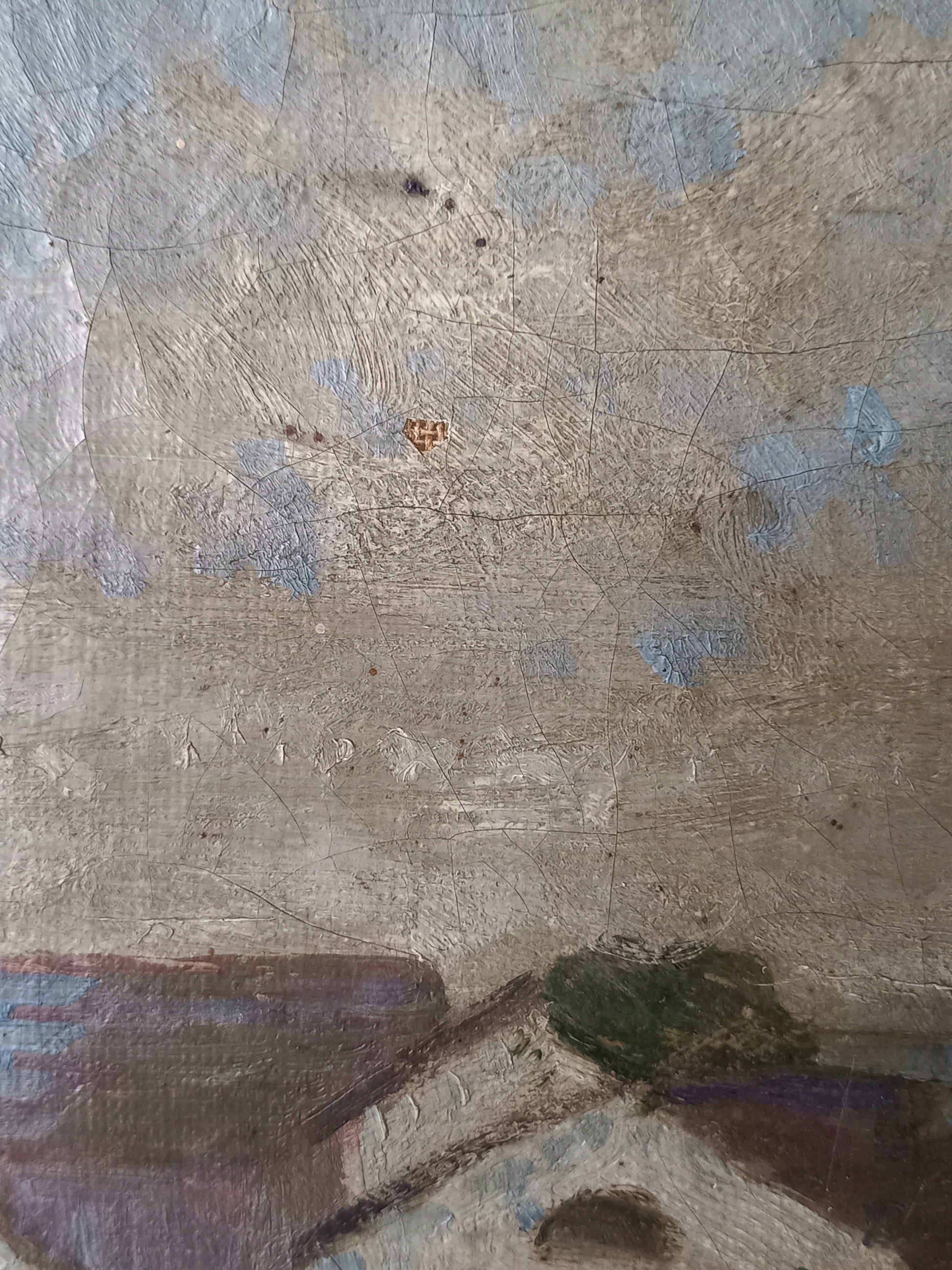 A close-up of a textured painting showing a rustic sky with blue patches and a small section of a house with a green tree above it.