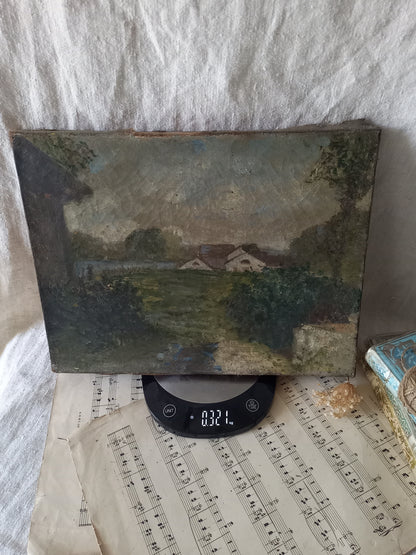 An antique oil landscape painting on canvas, displayed on a digital scale over vintage sheet music against a draped white fabric background.