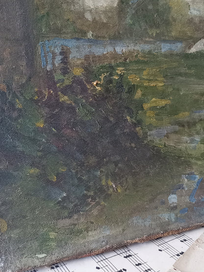 A close-up of an oil painting depicting a landscape with green and brown foliage, blue water, and yellow highlights, with a sheet of printed sheet music visible along the bottom edge.