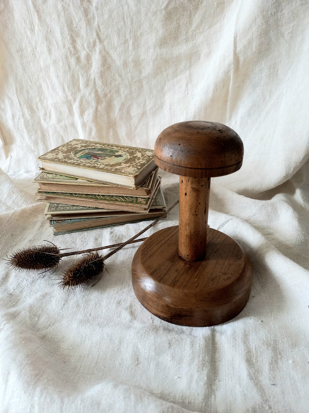 A beautiful French vintage/antique wooden hat stand/milliner's stand. This hand-made hat stand is a short, solid and sturdy piece with some good weight to it that will make a great piece of home decor in any interior, especially those inspired by rustic, country and farmhouse decor.