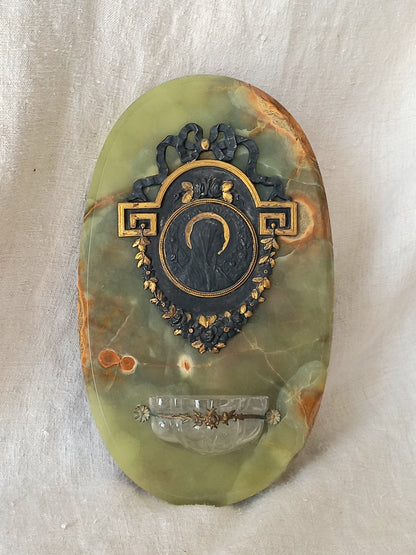 French antique Holy Water font made from onyx with intricate decorative detailing made from metal, a glass water font , and a brass back-plate with a hanging hook.
