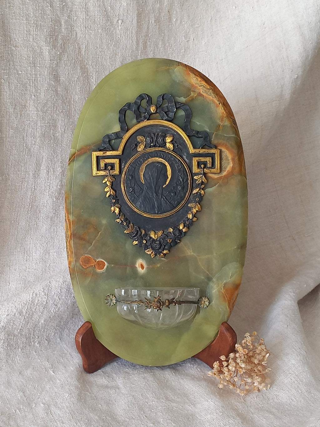 French antique Holy Water font made from onyx with intricate decorative detailing made from metal, a glass water font , and a brass back-plate with a hanging hook.