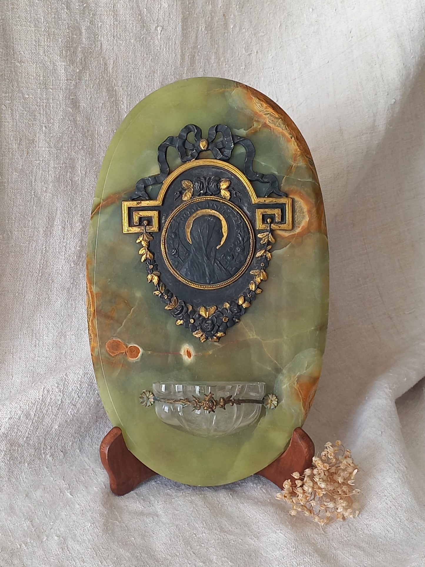 French antique Holy Water font made from onyx with intricate decorative detailing made from metal, a glass water font , and a brass back-plate with a hanging hook.