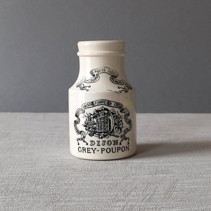 A beautiful French antique white ironstone mustard pot. This wonderful old jar was made by premier French manufacturer Sarreguemines and the maker's mark dates this particular pot as circa. late 1800s to early 1900s