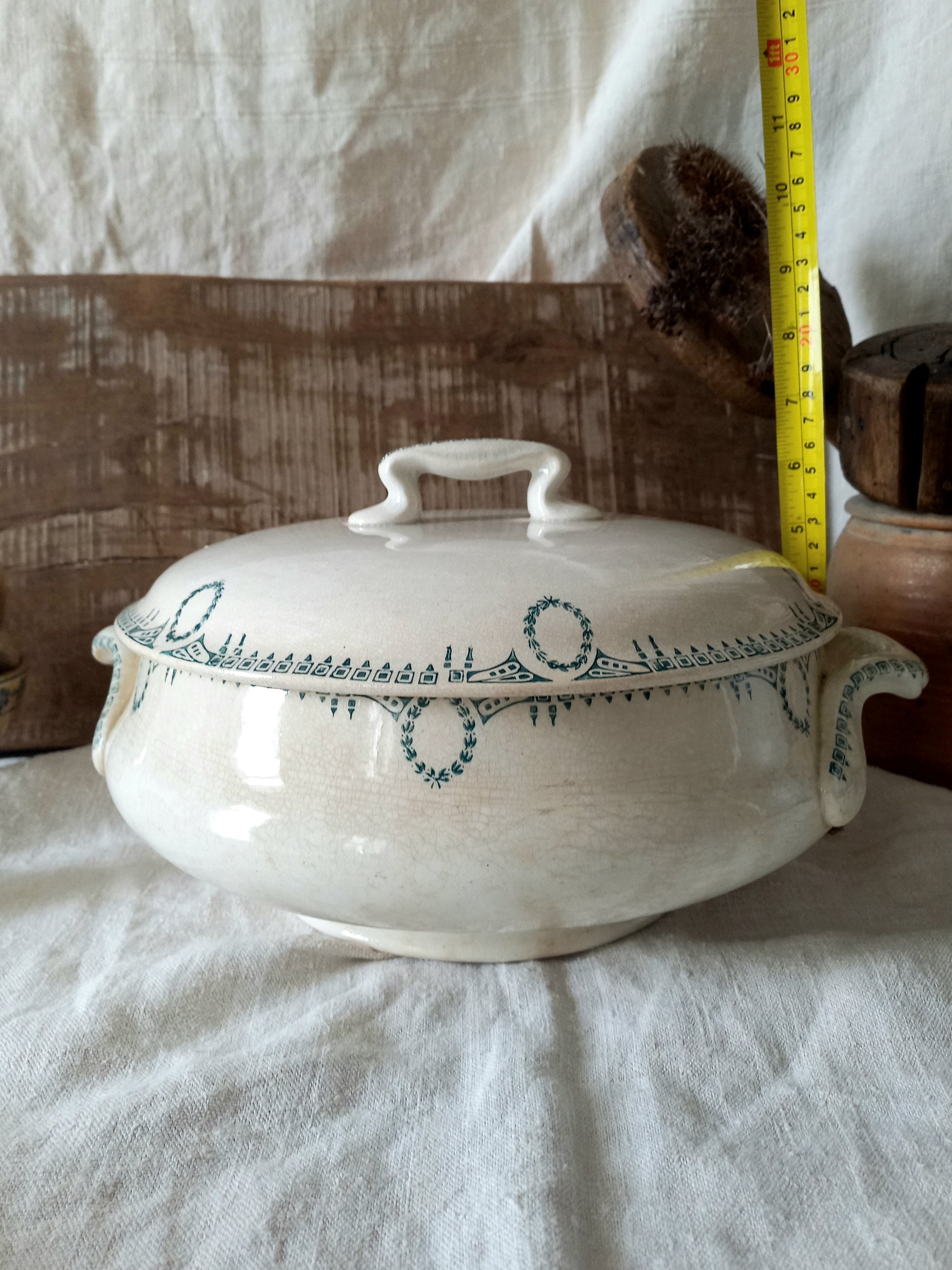 A large French antique white ironstone soup tureen with an attractive teal colour transferware design. Over the many decades this lovely old tureen has developed a time-worn patina with a warm, creamy white finish.
